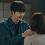 Supportive second male lead comforting the female protagonist in a poignant drama scene.